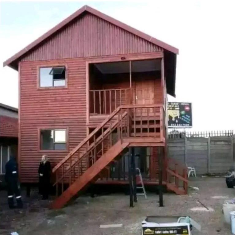 Log cabin with upper deck and balcony access
