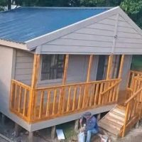 Nutec home with front patio and timber balustrades